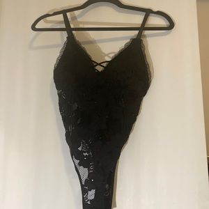 Black lace body suit